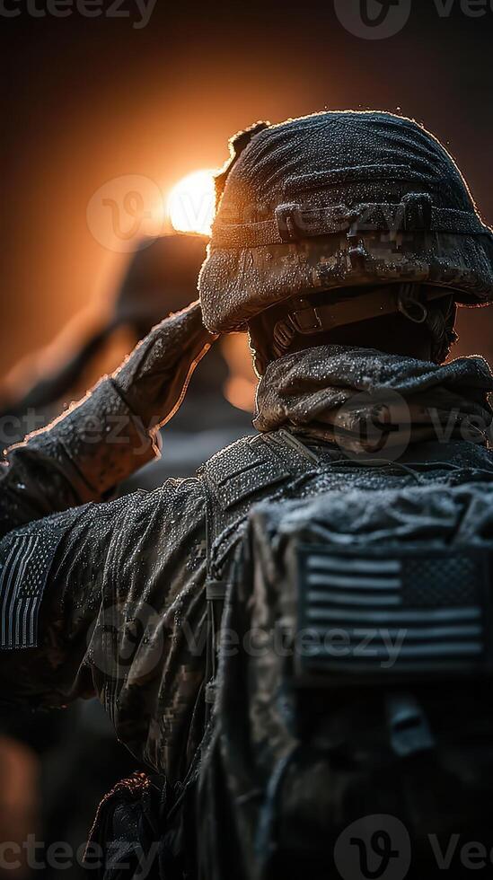Soldier salutes during sunrise in a frosty environment, highlighting dedication and resilience in challenging conditions photo