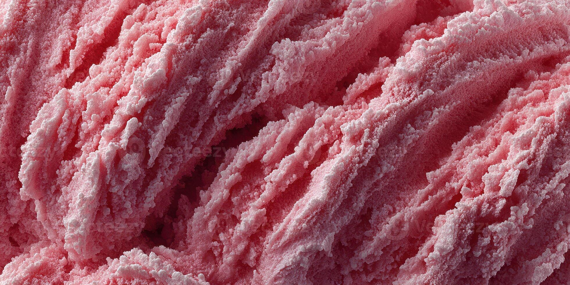 Soft pink cotton candy being spun at a fairground during a summer evening festival photo