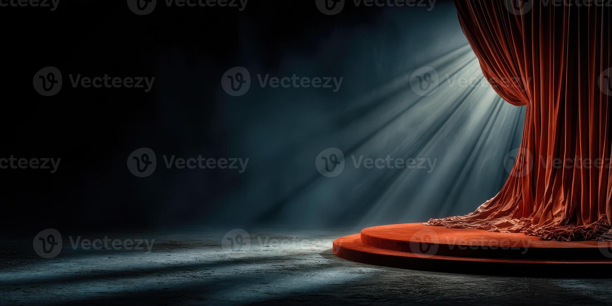 Curtain on stage with dramatic lighting highlighting the performance area during a theatrical production in an empty auditorium photo