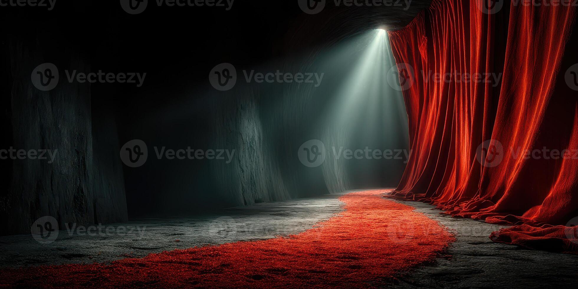 Red curtain and spotlight creating a mysterious atmosphere in a dimly lit space with a textured floor photo
