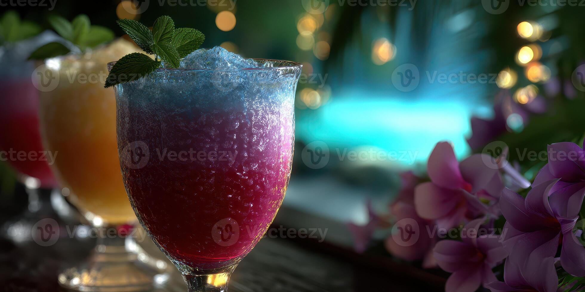 Colorful mocktails served in elegant glasses beside a beautiful pool with floral accents at a tropical evening gathering photo
