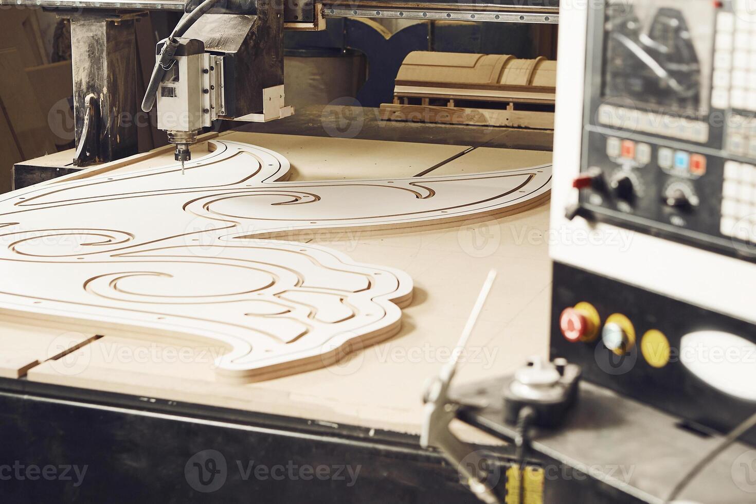 Cnc machine working, cutting wood. Woodwork industry. photo
