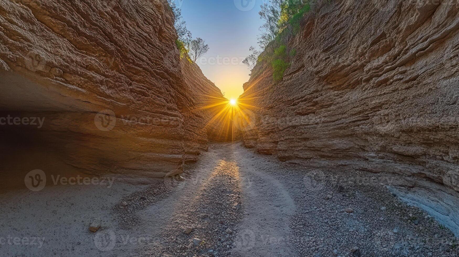 The sun shines through the canyon in this photo
