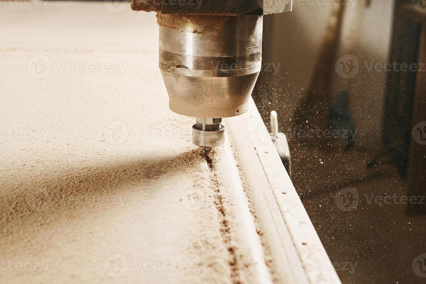 CNC router machine creates a layout of the shelf complex. photo
