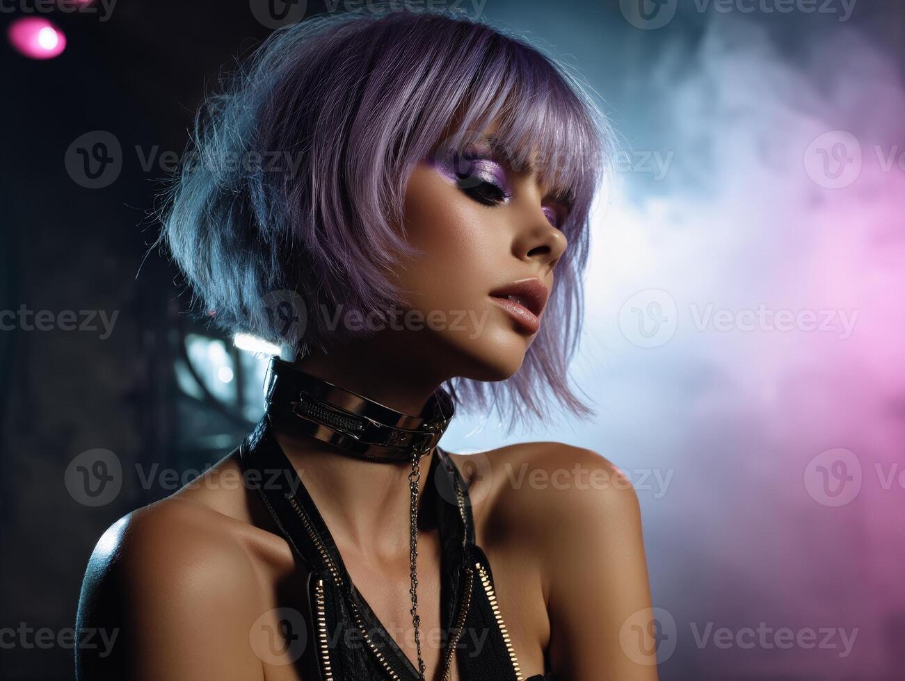 Stylish woman with striking purple bob hairstyle and bold makeup, wearing a black leather outfit and choker. Colorful lighting creates a moody and artistic atmosphere photo
