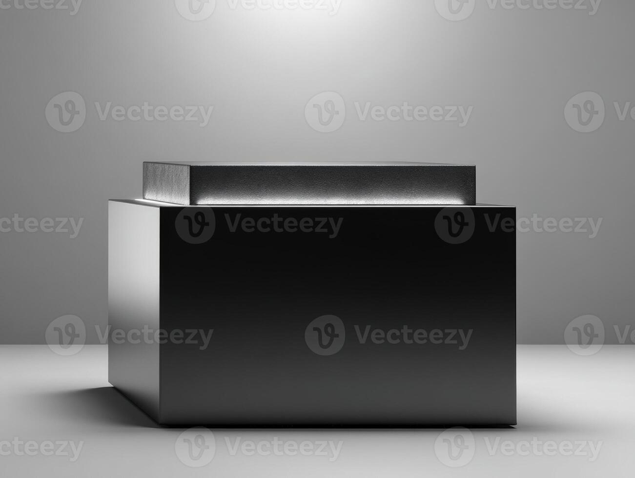 Sleek black geometric cube with a smaller raised section on top, creating a minimalist and modern look, with diffused light highlighting its edges and casting soft shadows photo