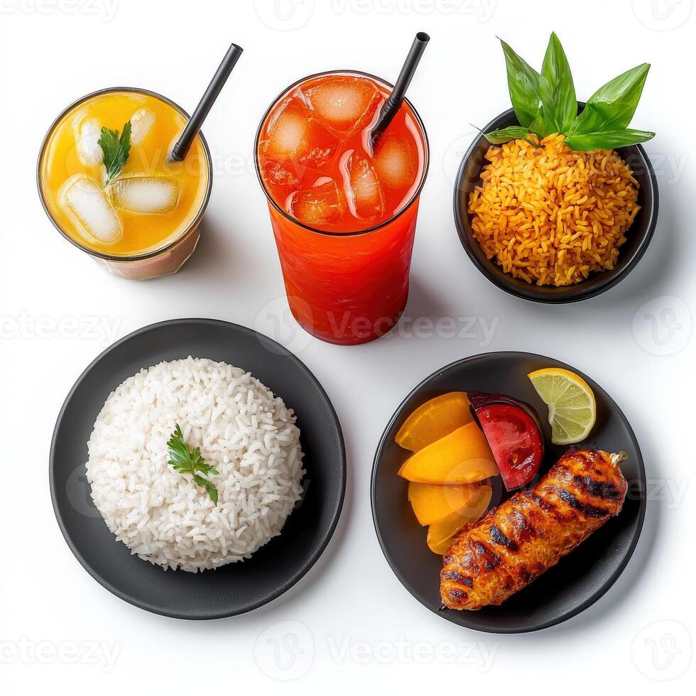 Various types of food including rice, meat, and drinks photo