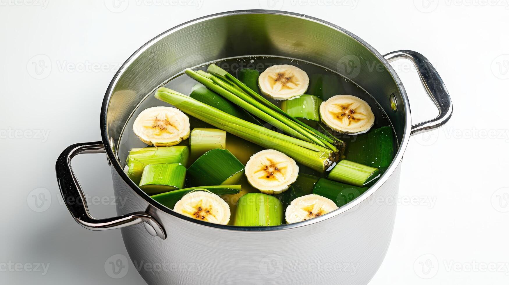 A pot filled with bananas and celery photo