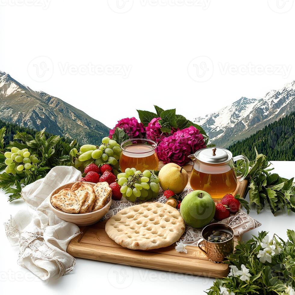 A tray with fruit, bread, tea and a bowl of fruit photo