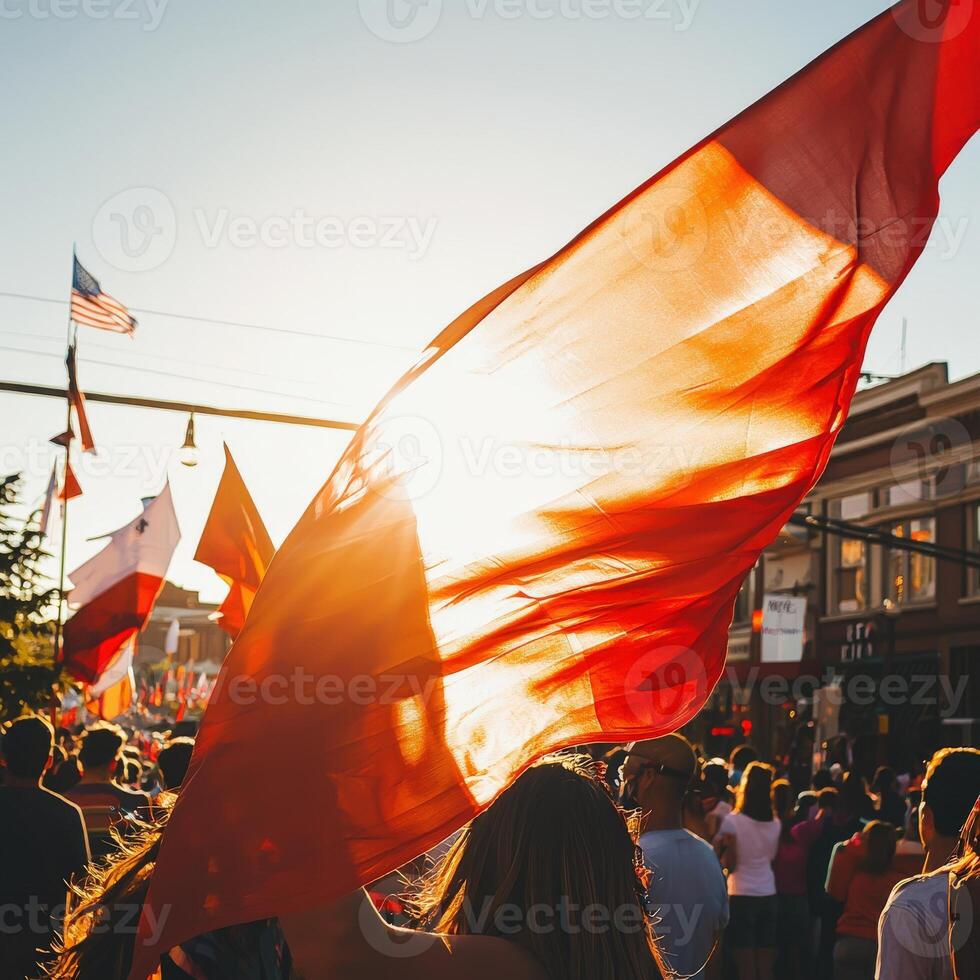 A group of people standing in a street with a red flag photo