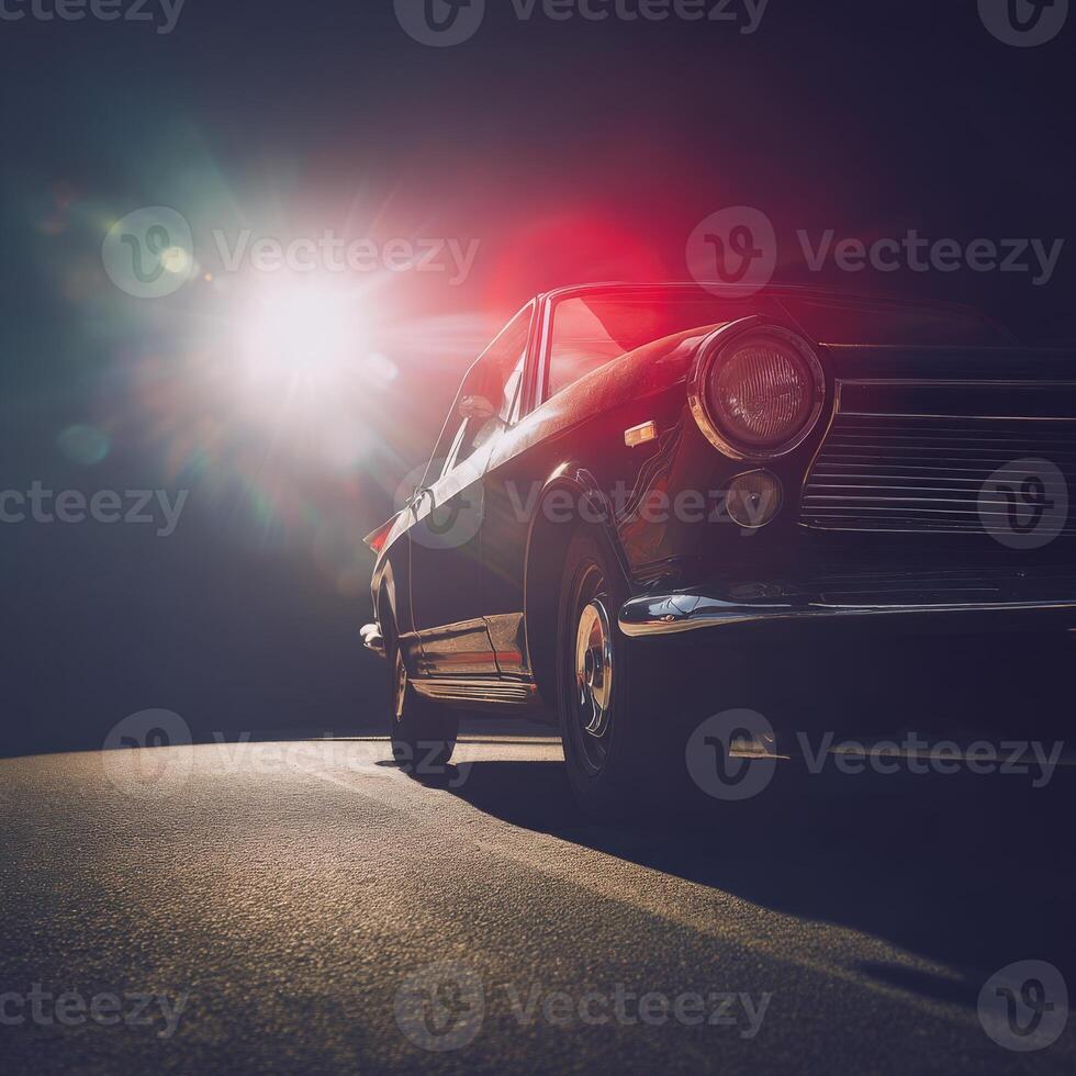 Retro car on the road at night with the sun shining photo