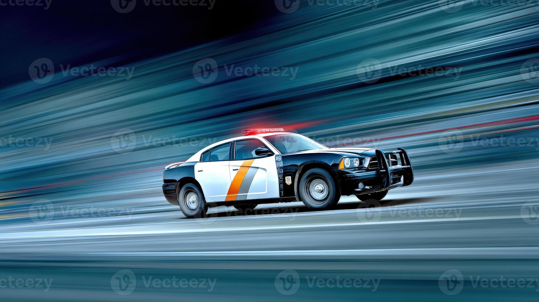 A police car speeding down the road photo