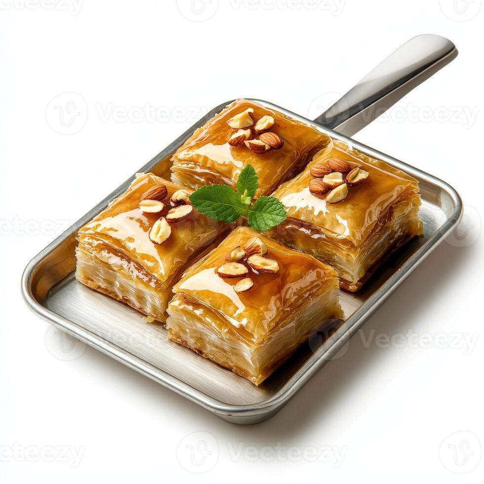 A tray with four pieces of baklava on it photo
