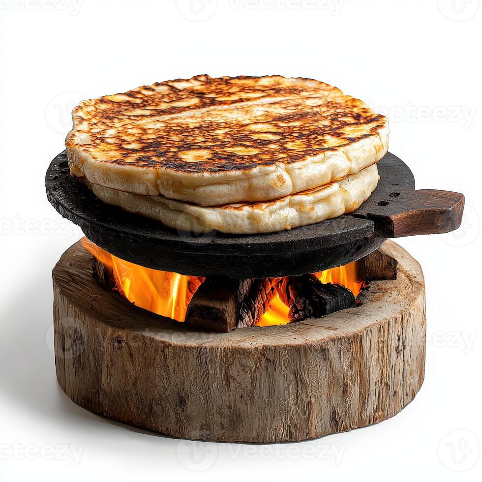A stack of pancakes on a grill photo