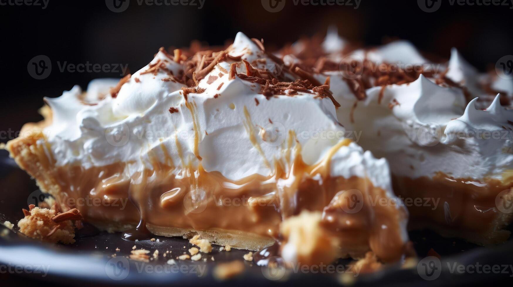 A slice of pie with whipped cream and caramel photo