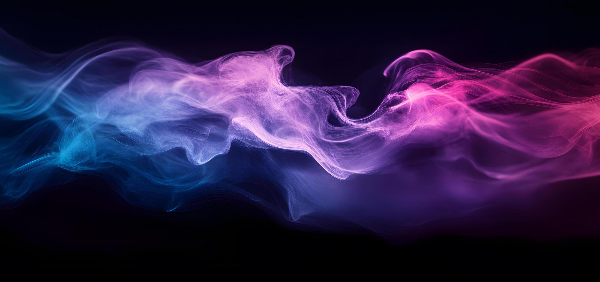 Abstract colorful smoke or vapor flows gently with a black background, creating a calming visual photo
