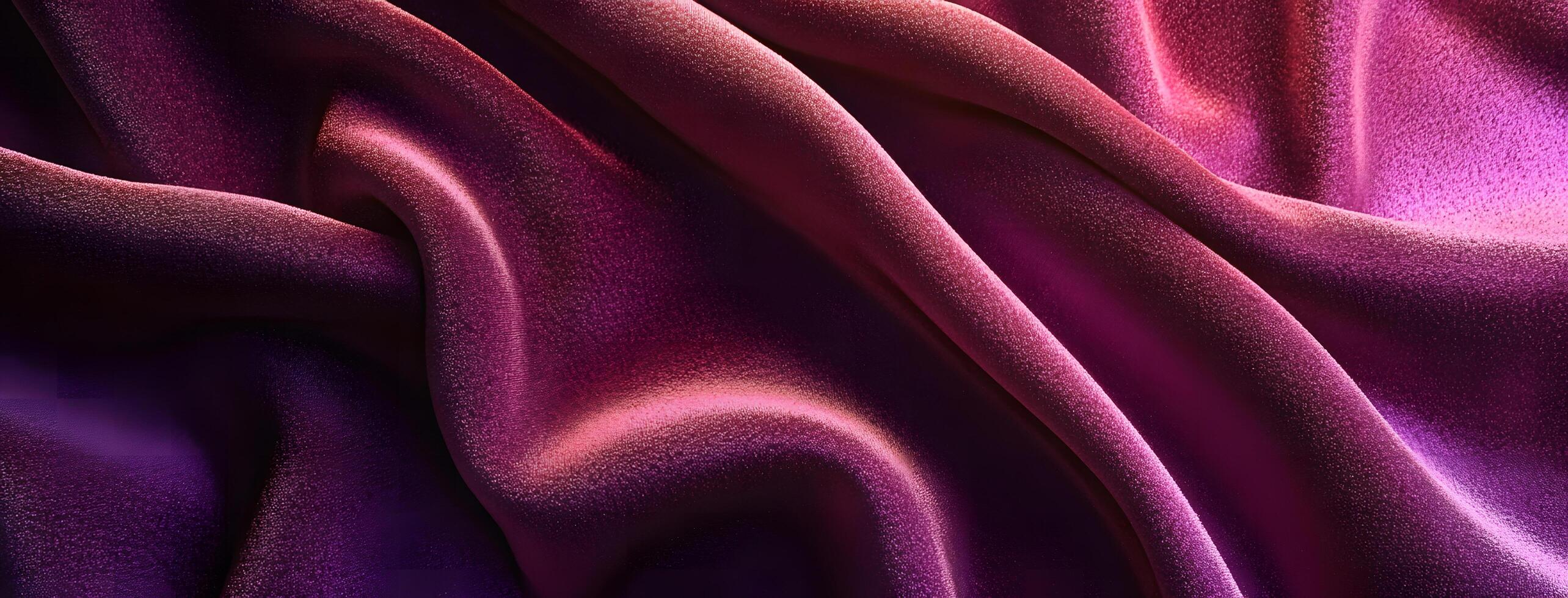 Abstract pink fabric cascades gracefully, showing its shiny textures and captivating color shifts photo
