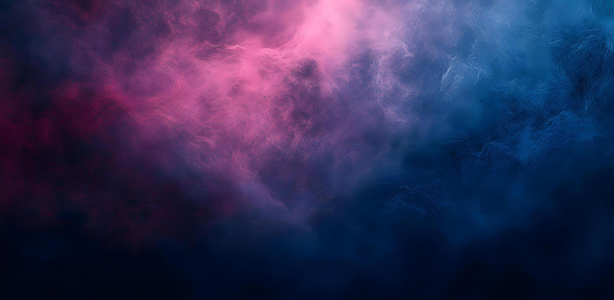 Abstract sky blends pink and blue hues into the soft dark gradient background photo