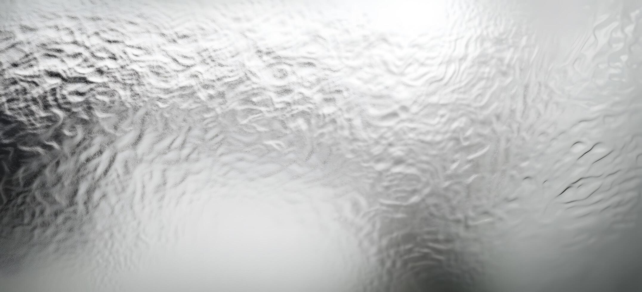 An abstract view showcases texture and flowing patterns on a frosted glass surface photo