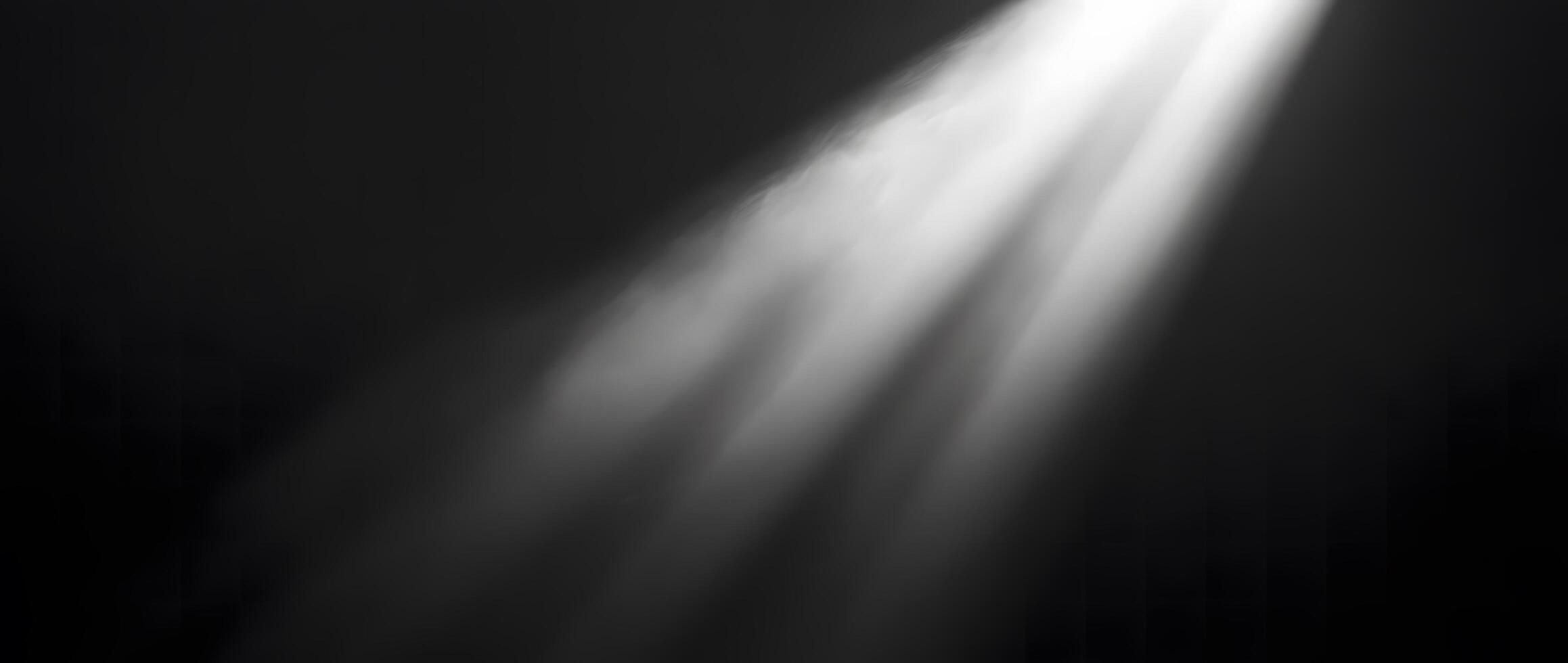 Bright, white beams of light pierce through the dark, misty space elegantly photo