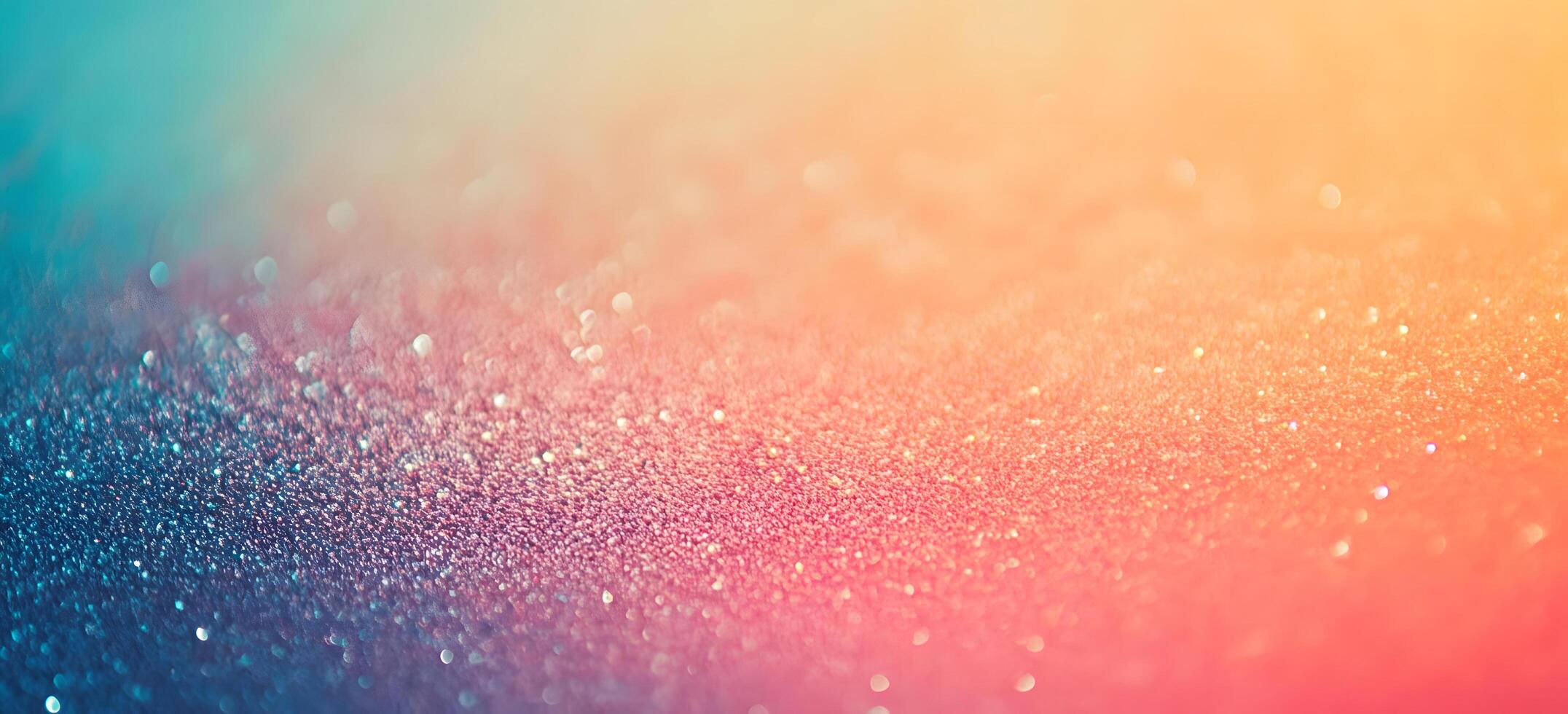 Glimmering specks create an ethereal pastel gradient spanning from blue to orange in an abstract texture photo