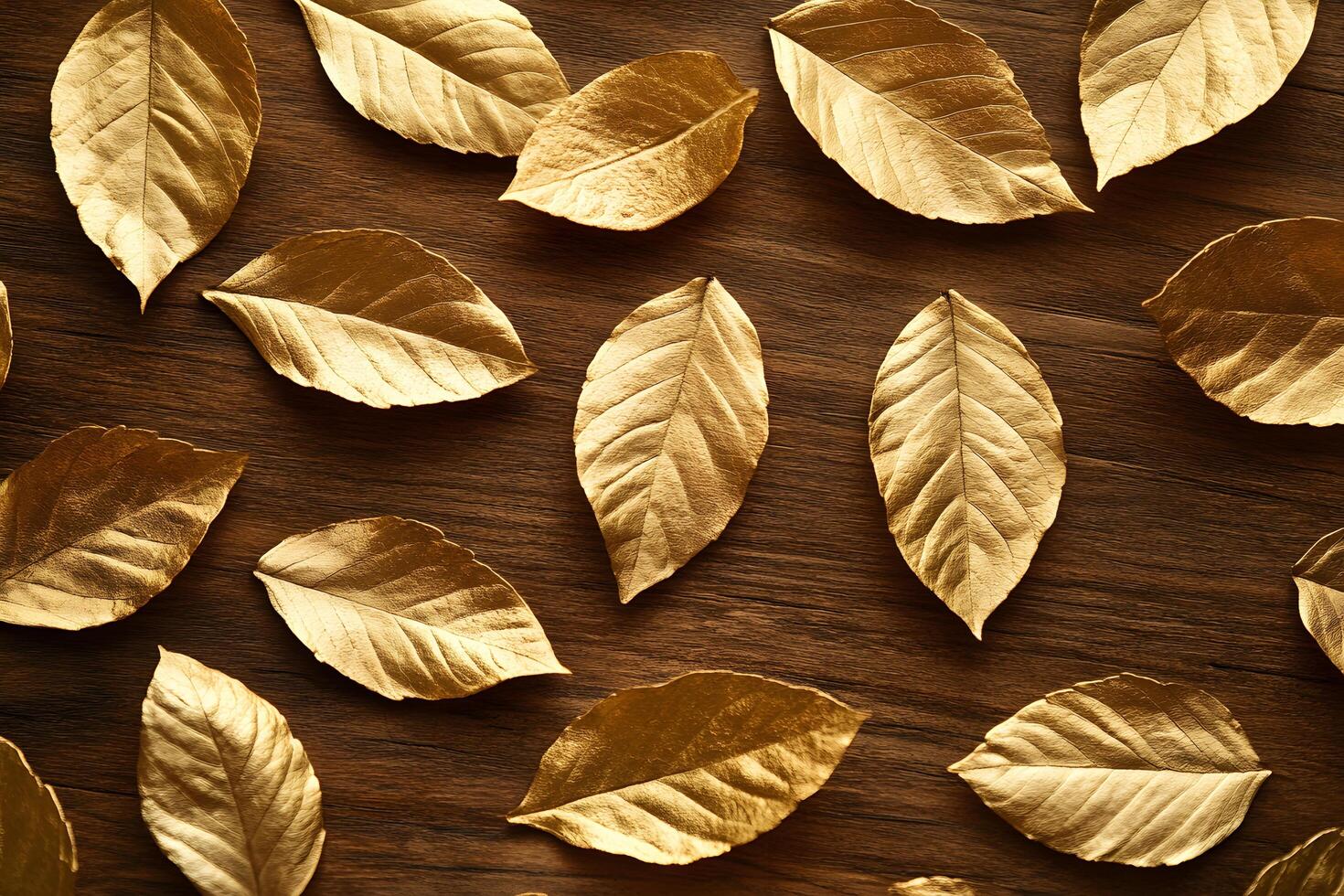 Glistening golden foliage elegantly rests upon a rich, rustic wooden surface creating a luxurious texture photo