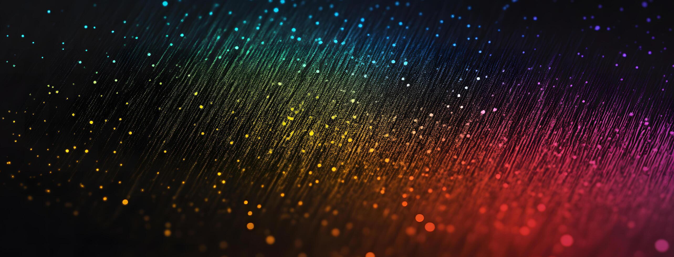 Gradient rainbow lights cascade down a dark background creating a colorful abstract effect photo