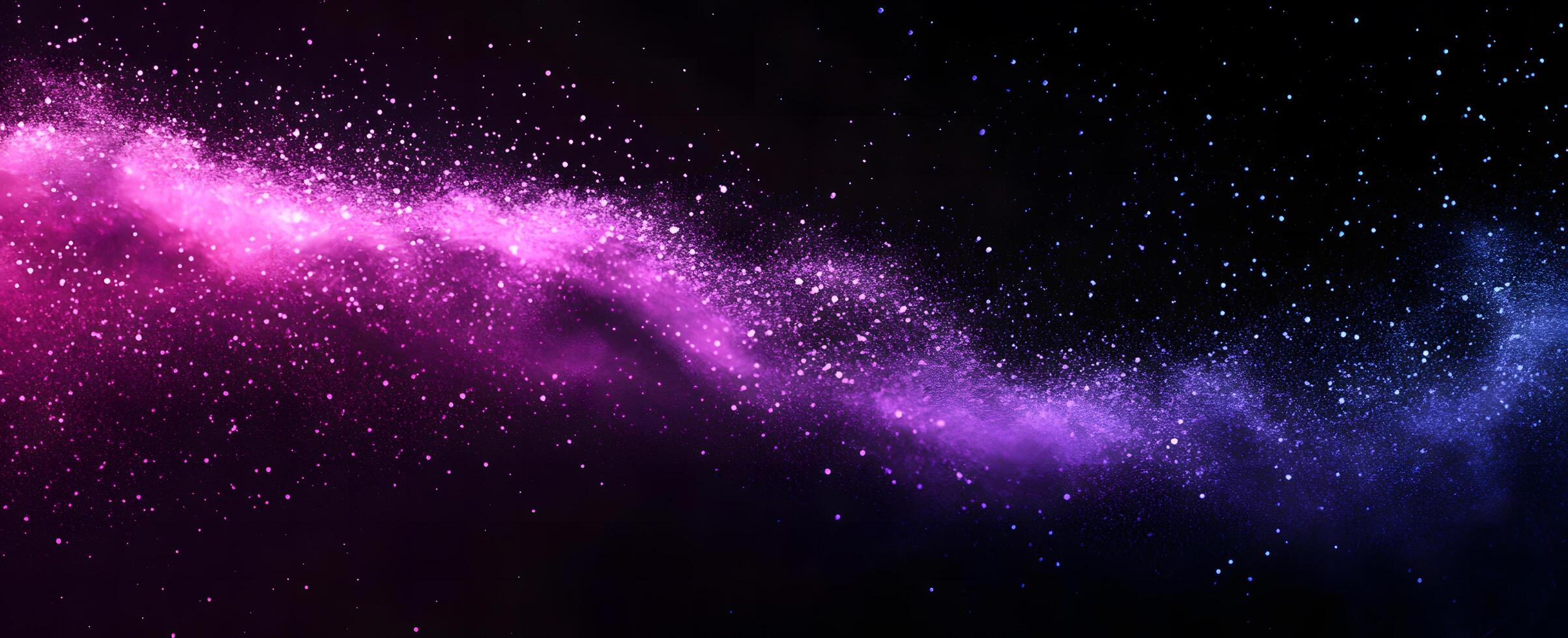 Pink and blue glitter flows across a black expanse like a radiant river photo
