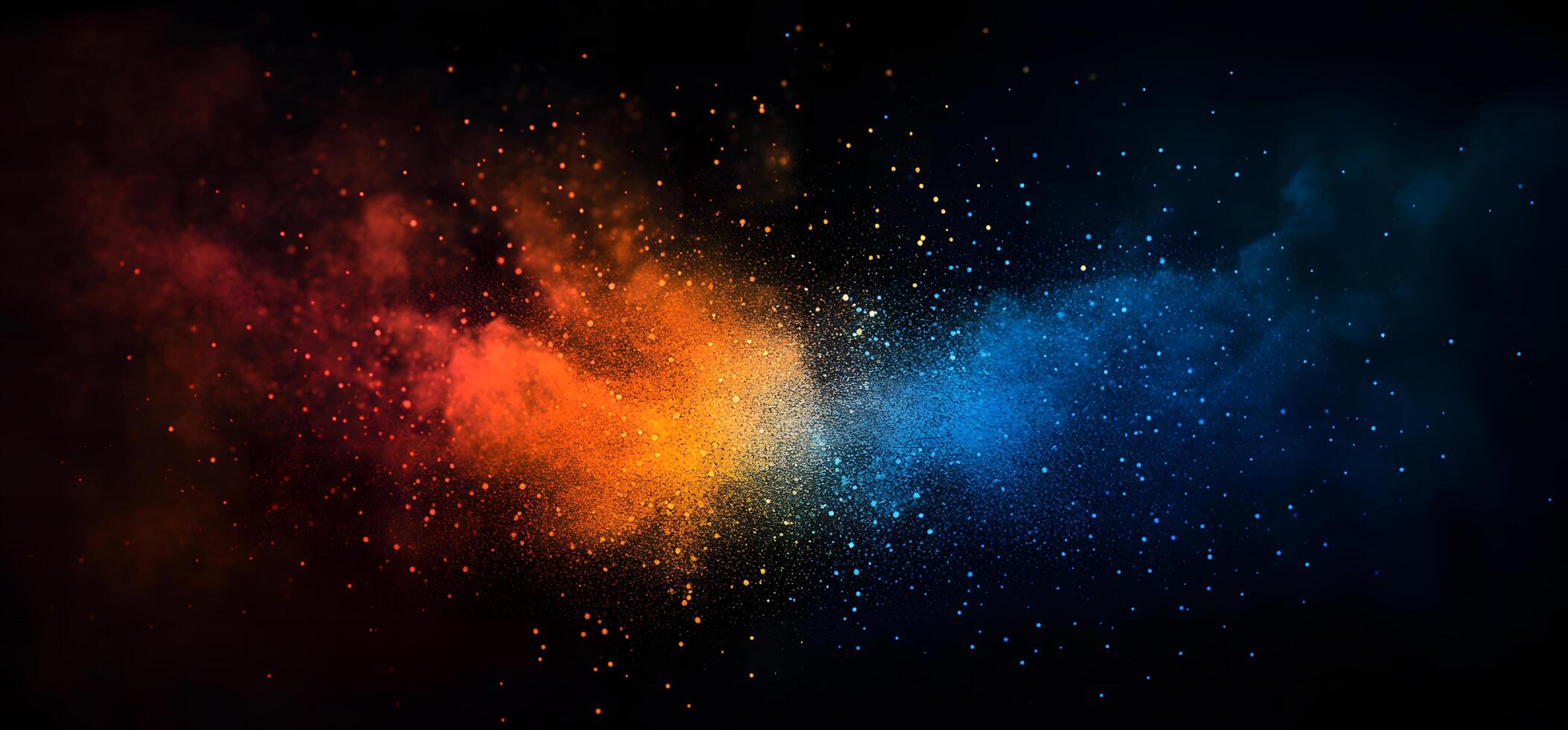 Red, orange, and blue colored dust particles beautifully collide in the dark space photo