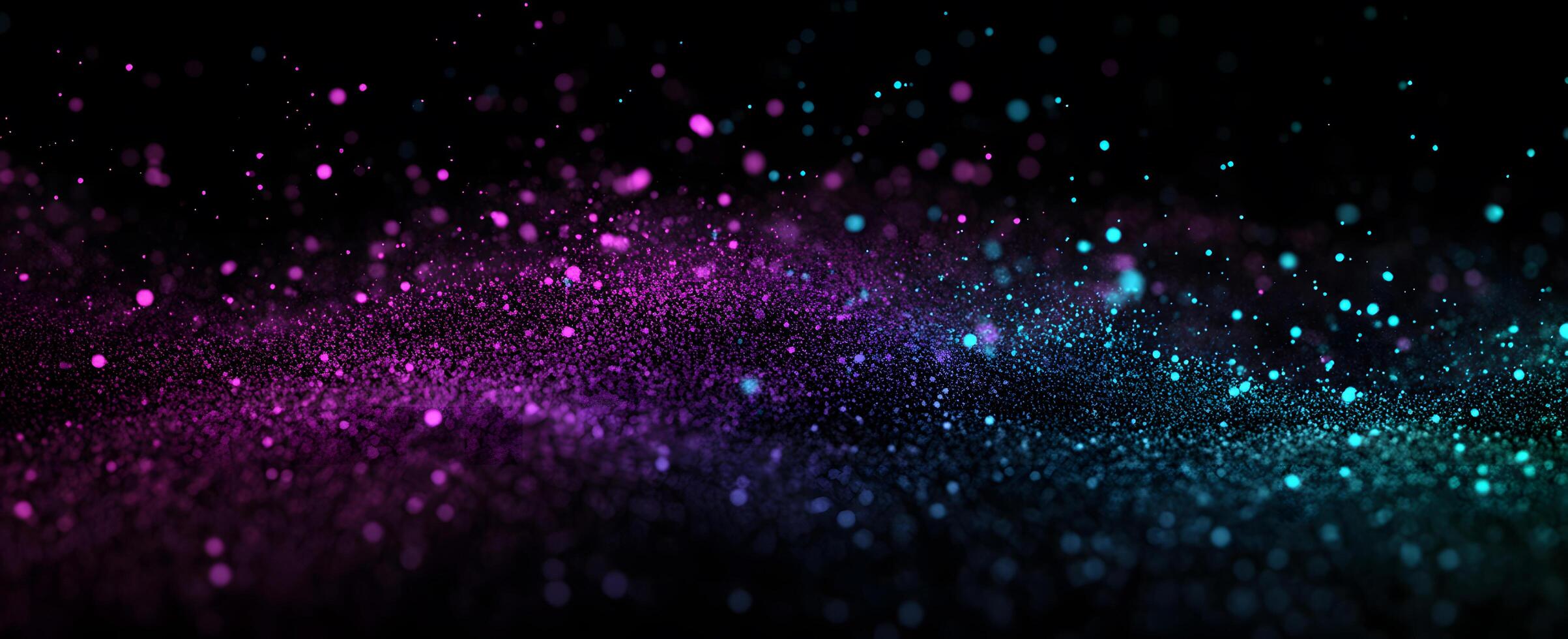 Shimmering pink and turquoise particles elegantly float and subtly dance against a black background photo