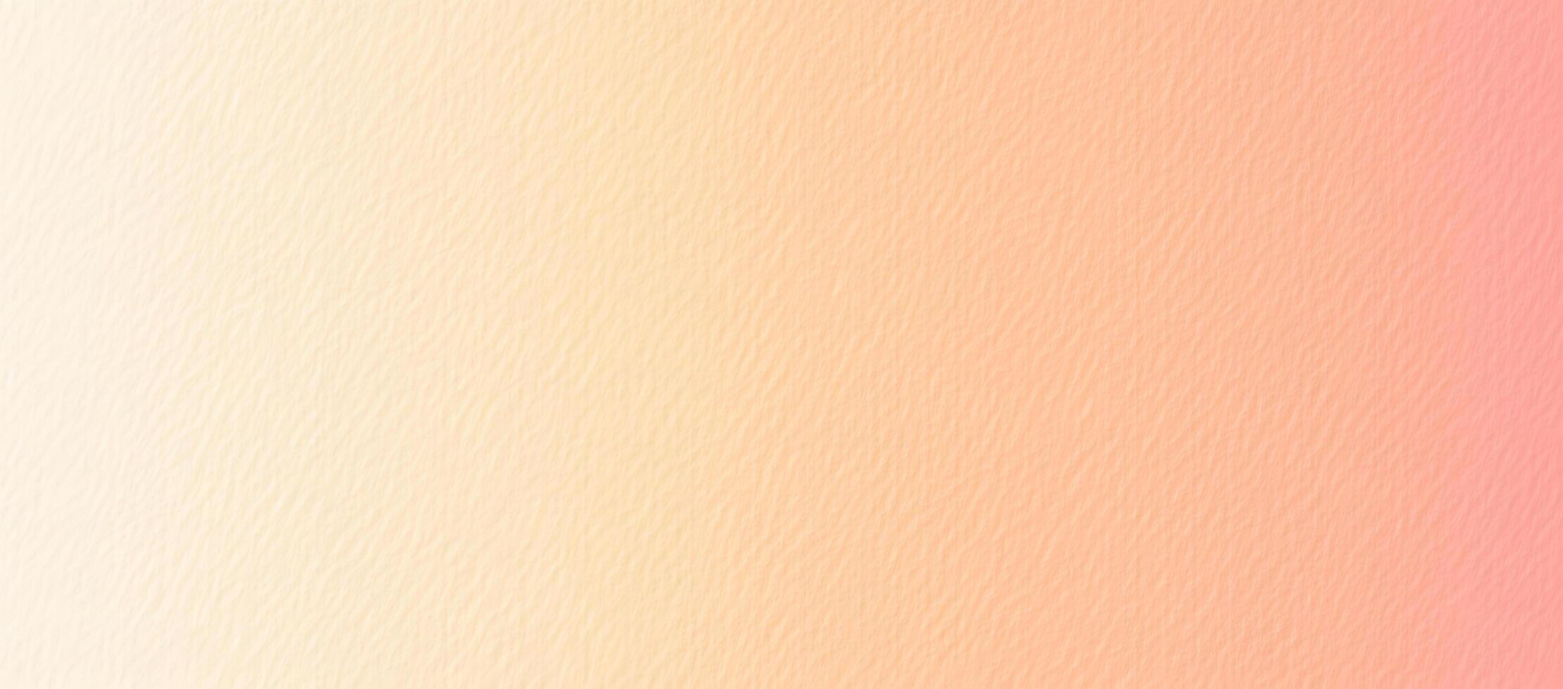 Soft peach hues smoothly blend, creating a warm and inviting textured gradient background photo