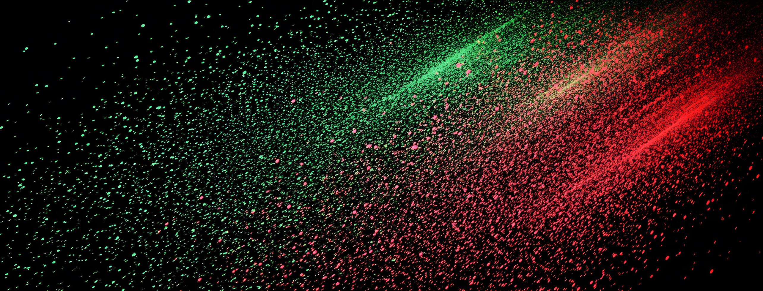 Spattered vibrant colors create a beautiful dynamic composition across the entire black background elegantly photo