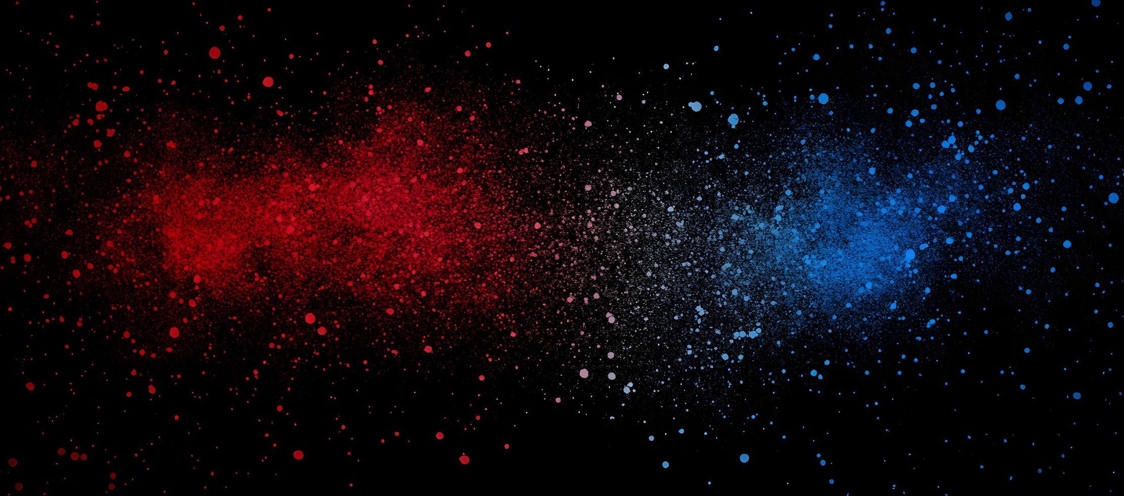 Vivid red and blue paint splatters create a dynamic contrast on a black canvas photo