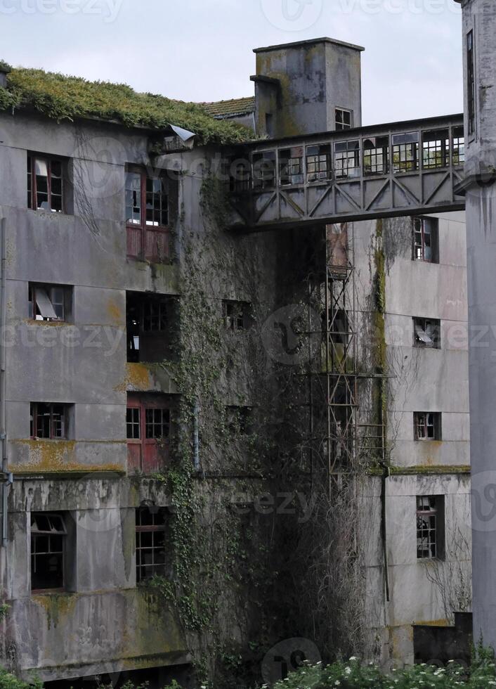 Abandoned building in Vigo, Spain, in the evening hours photo