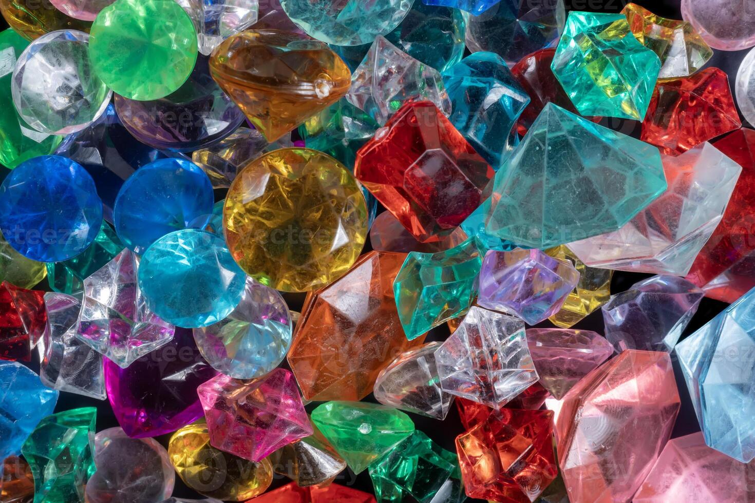 Colorful gemstones and crystals in a variety of vibrant colors and shapes. photo