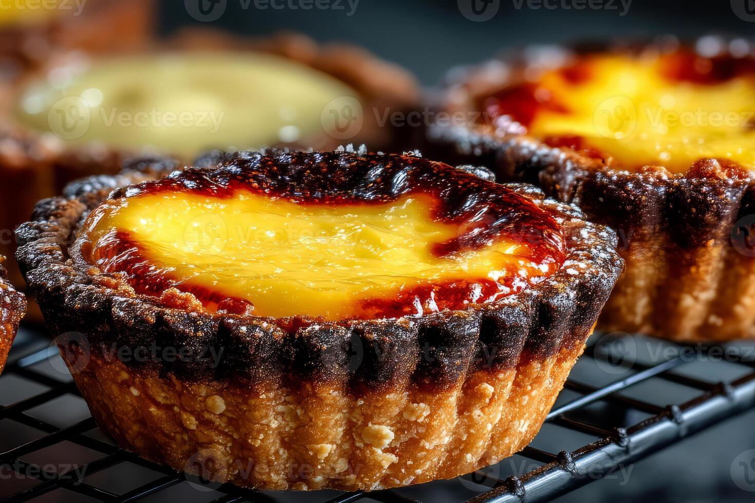 Traditional egg tart with flaky crust and glossy custard center photo