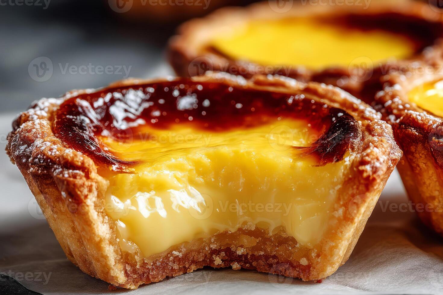 Chinese egg tart with caramelized top and custard filling photo