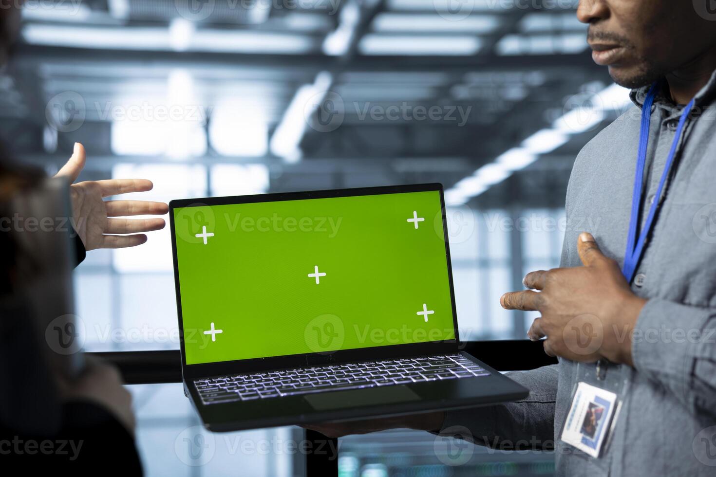 Mockup laptop used by data center computer scientists reviewing equipment diagnostics. Close up of chroma key notebook used by teamworking IT experts adjusting server room configurations photo