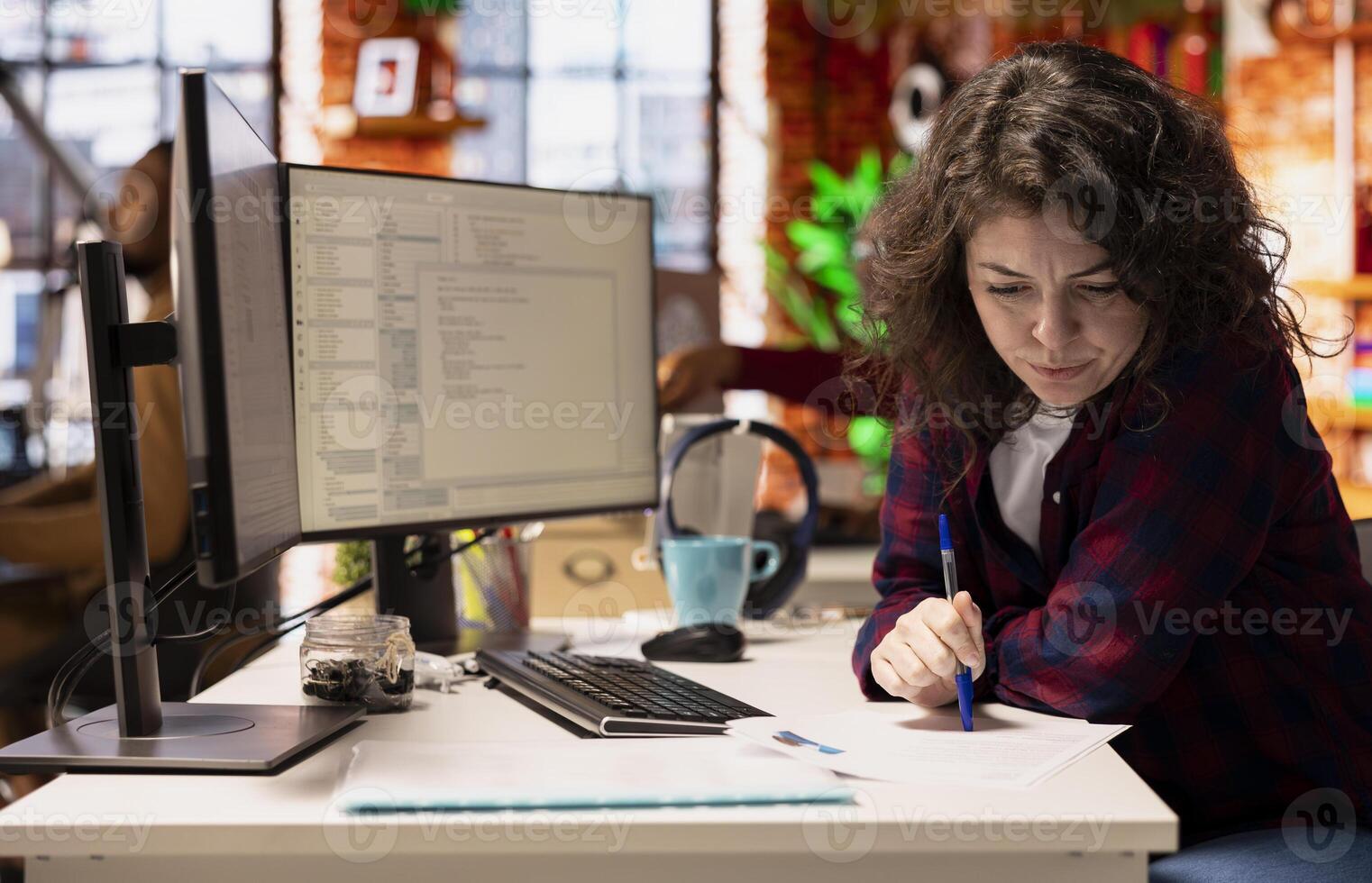 HR employer preparing interview questions to vet selected applicants and ensure their skills are strong enough match for role. Tech startup recruiter assessing candidate work experience photo