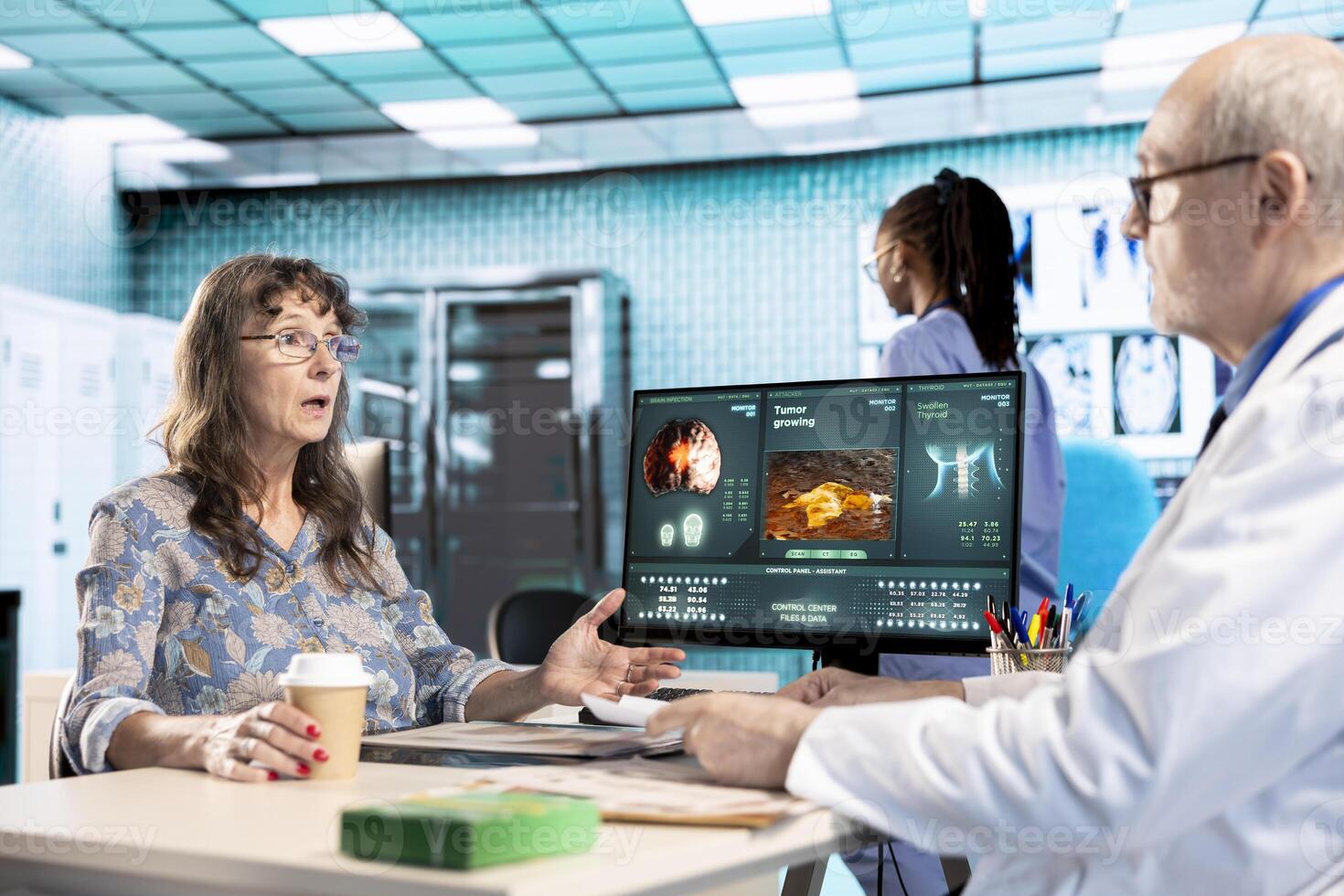 Old woman asking her general practitioner about disease prevention and a new treatment, ensuring the remedy while they examine the x ray test findings. Health insurance at the facility. photo