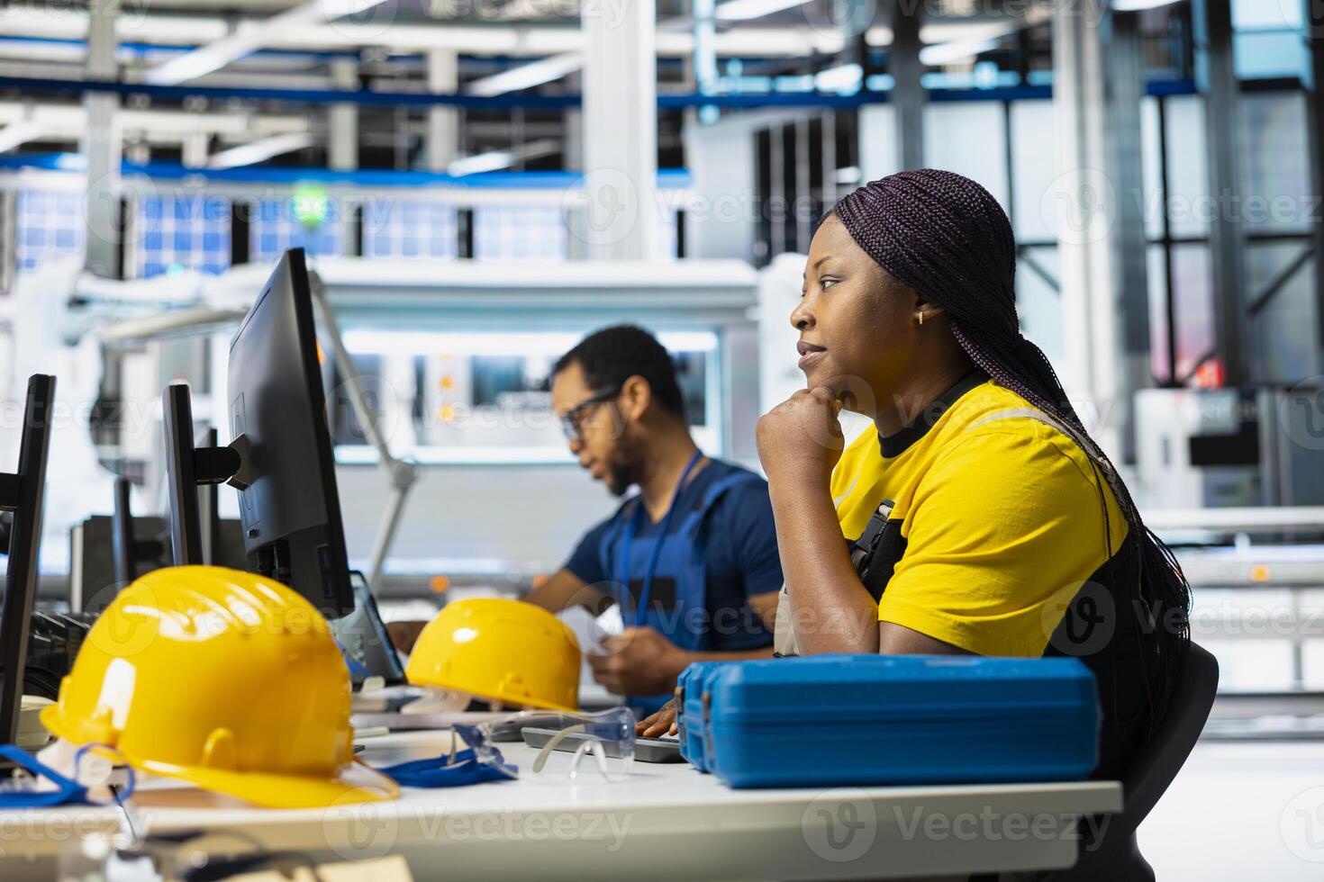 Solar panels factory engineer optimizing production flow on desktop setup, assembly line. Sustainable energy plant specialist monitoring manufacturing process, photovoltaic system. photo