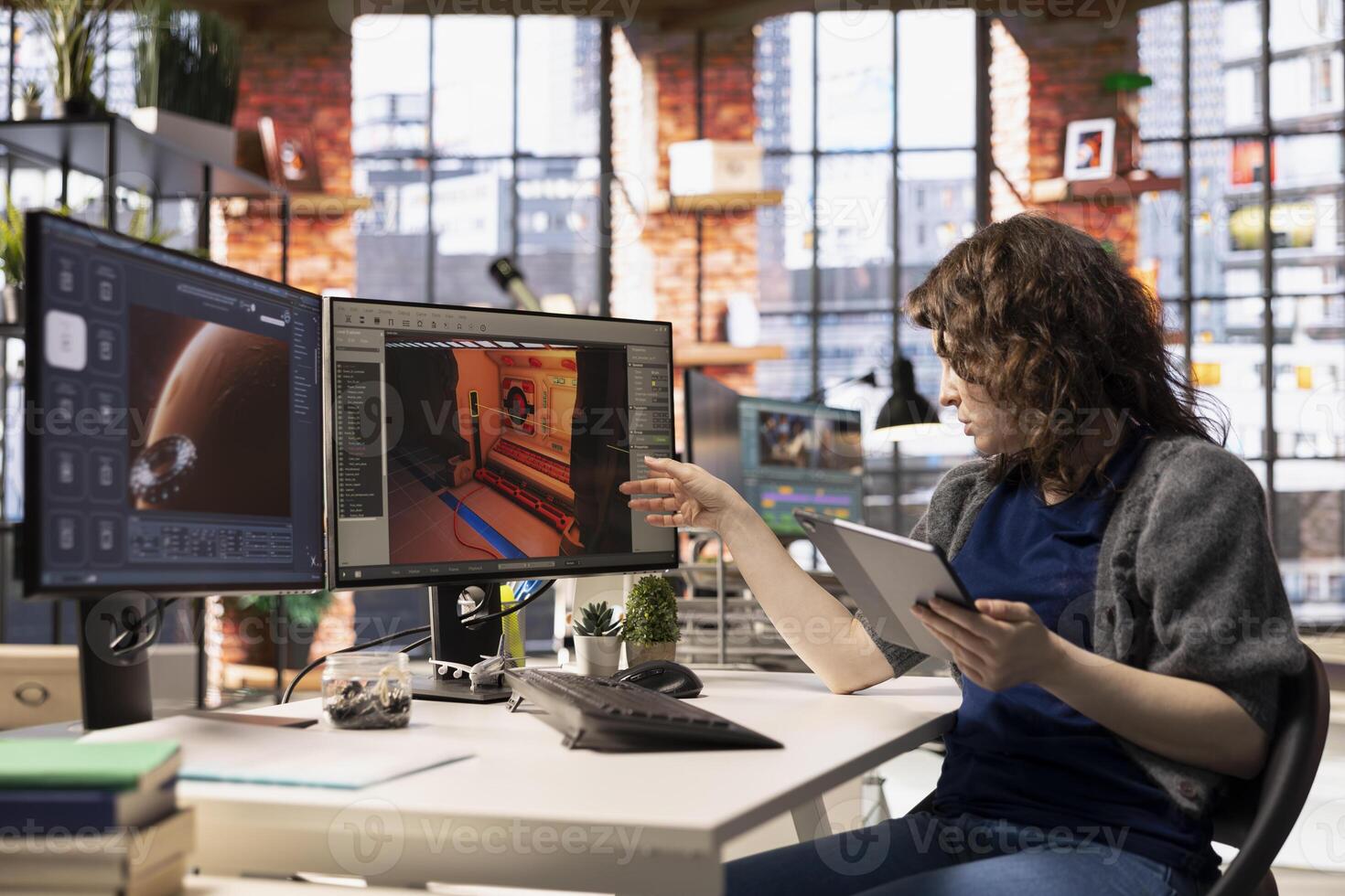 Female game developer interacts with AI powered assistant on computer, using automation to help generate a spatial game environment. Machine learning used for creative tasks. photo