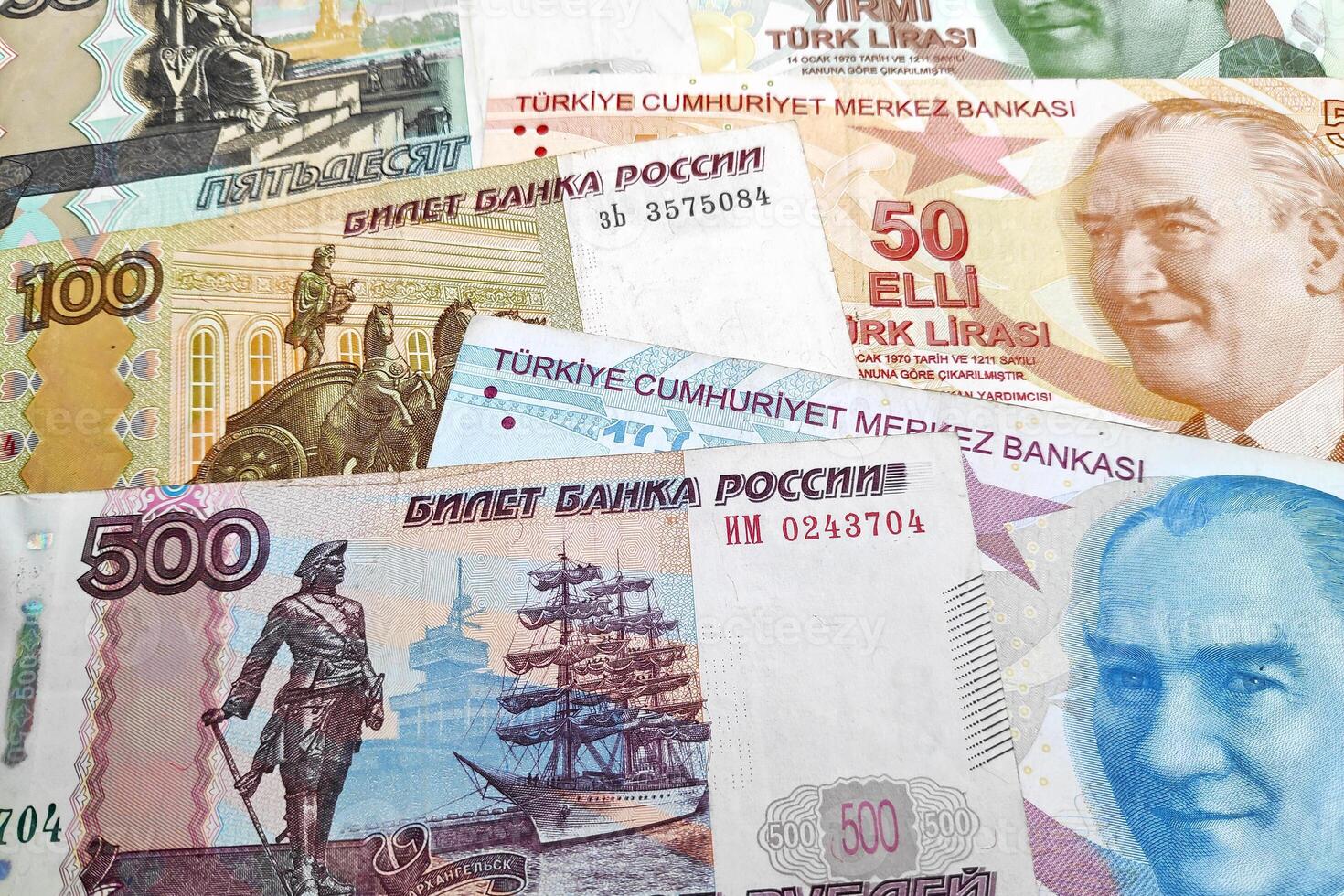 Stack of Russian Rubles and Turkish Lira photo