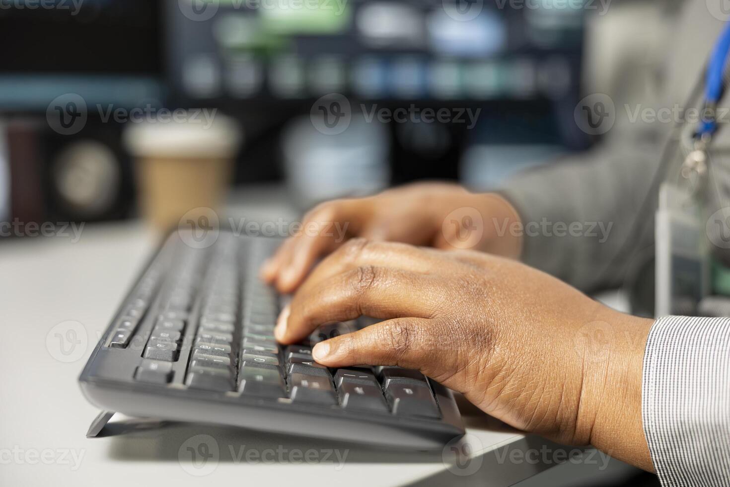 Close up of server room software developer using computer to implement data backup solutions. Data center employee typing on PC keyboard, resolving technical errors, ensuring efficient recovery photo
