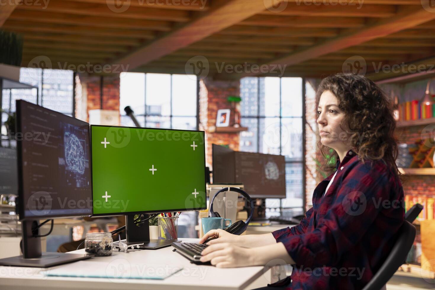System administrator using isolated screen PC working with artificial intelligence technology in tech startup. Mockup computer display used by IT expert developing AI systems in tech startup photo