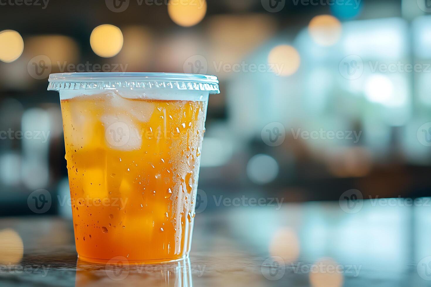 cup of iced tea on a table photo
