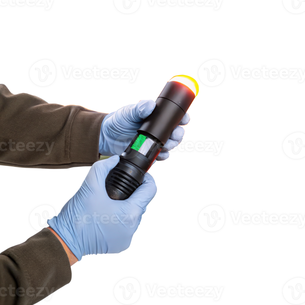 Technician wearing gloves holding electronic device with illuminated tip on transparent background png