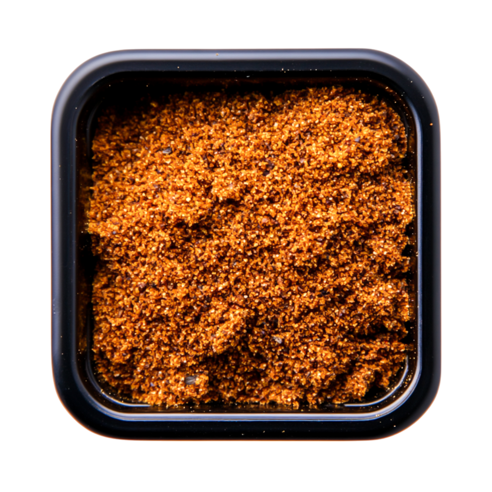 closeup View of Fine Brown Spices in Black Square Container for Culinary Use png