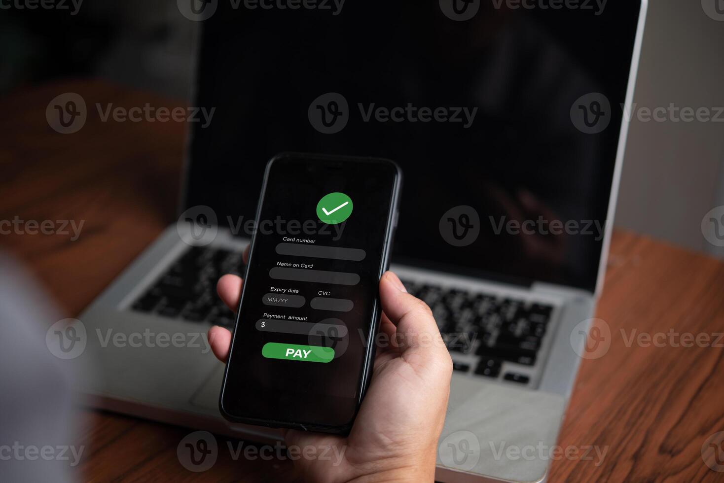 A person using a smartphone to login to a website photo