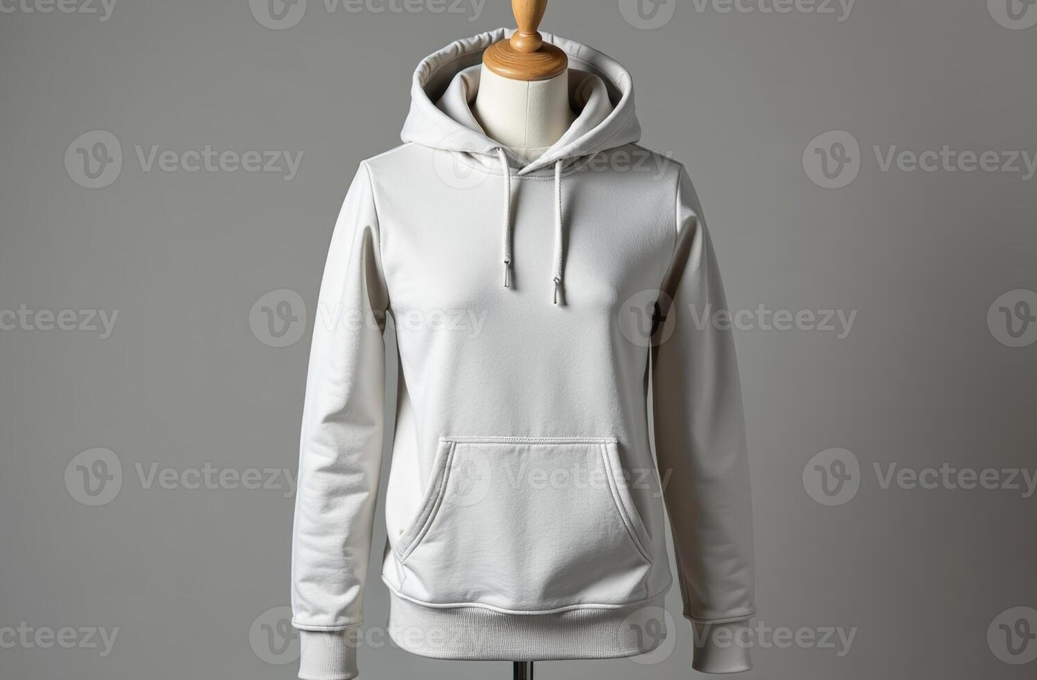 Stylish white hoodie displayed on a mannequin in a minimalist setting showcasing contemporary fashion design photo